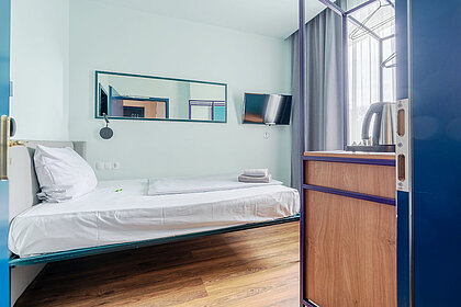 Preiswertes Hotelzimmer in München mit Schreibtisch, Flat-TV und kostenlosem High-Speed WLAN