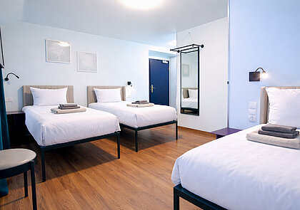 Economy Drei-Bett Zimmer für günstige Übernachtungen in München - sogar mit Komfort
