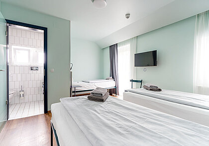 Economy Drei-Bett Zimmer für günstige Übernachtungen in München - sogar mit Komfort