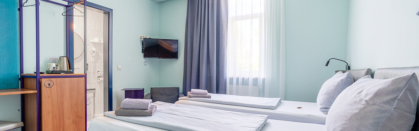 Economy Doppelzimmer für günstige Übernachtung in München - sogar mit Komfort